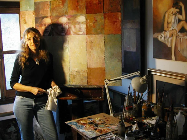 Artist in Studio with Portrait Panel by Martha Escondeur